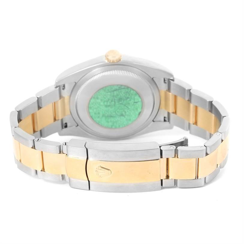 The image shows the back view of a Rolex Datejust 116203 Men's Stainless Steel Black Dial 116203 Men's Stainless Steel Black Dial watch, highlighting its two-tone bracelet and case back.