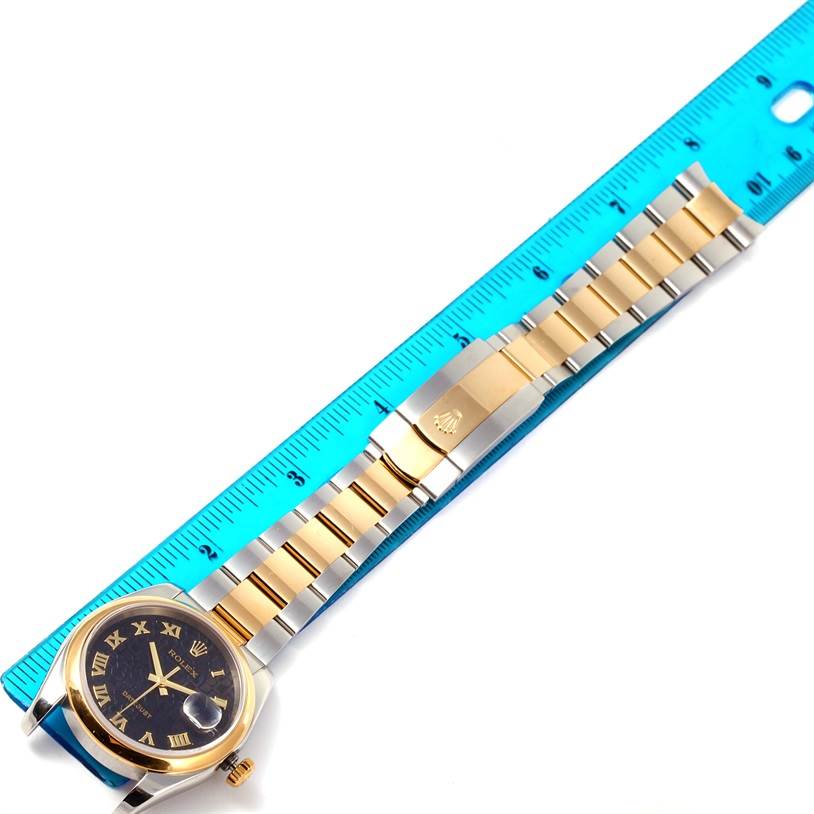 The image shows a Rolex Datejust 116203 Men's Stainless Steel Black Dial 116203 Men's Stainless Steel Black Dial watch including the face, bezel, bracelet, and clasp, measured against a blue ruler.