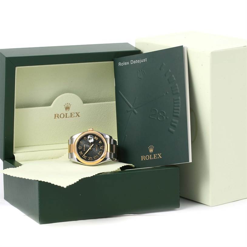 The Rolex Datejust 116203 Men's Stainless Steel Black Dial 116203 Men's Stainless Steel Black Dial watch is shown at an angle from the front, accompanied by its box and instruction booklet.