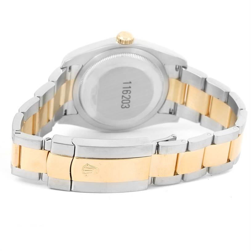 The image shows the backside and bracelet of a Rolex Datejust 116203 Men's Stainless Steel White Dial 116203 Men's Stainless Steel White Dial watch, highlighting the clasp and stainless steel with gold links.