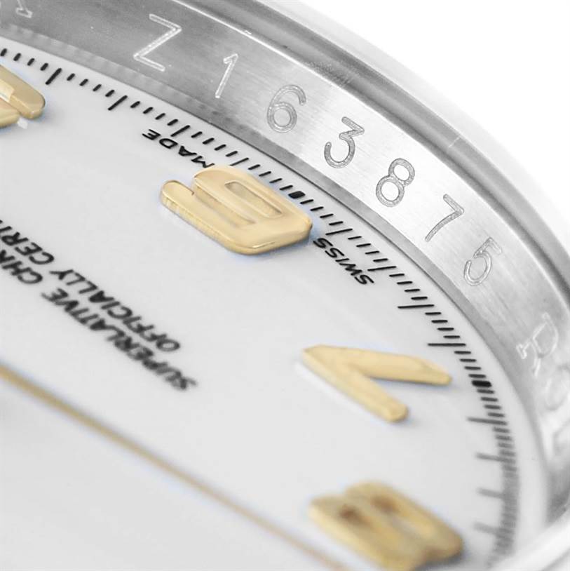 This image shows a close-up of the dial and bezel of a Rolex Datejust 116203 Men's Stainless Steel White Dial 116203 Men's Stainless Steel White Dial watch, highlighting the numerals and "Swiss Made" text.