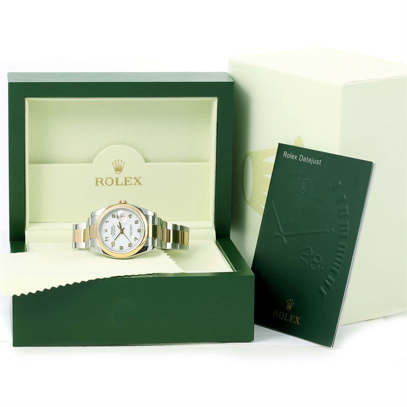 This image shows a Rolex Datejust 116203 Men's Stainless Steel White Dial 116203 Men's Stainless Steel White Dial watch in its green box with a manual and outer packaging.