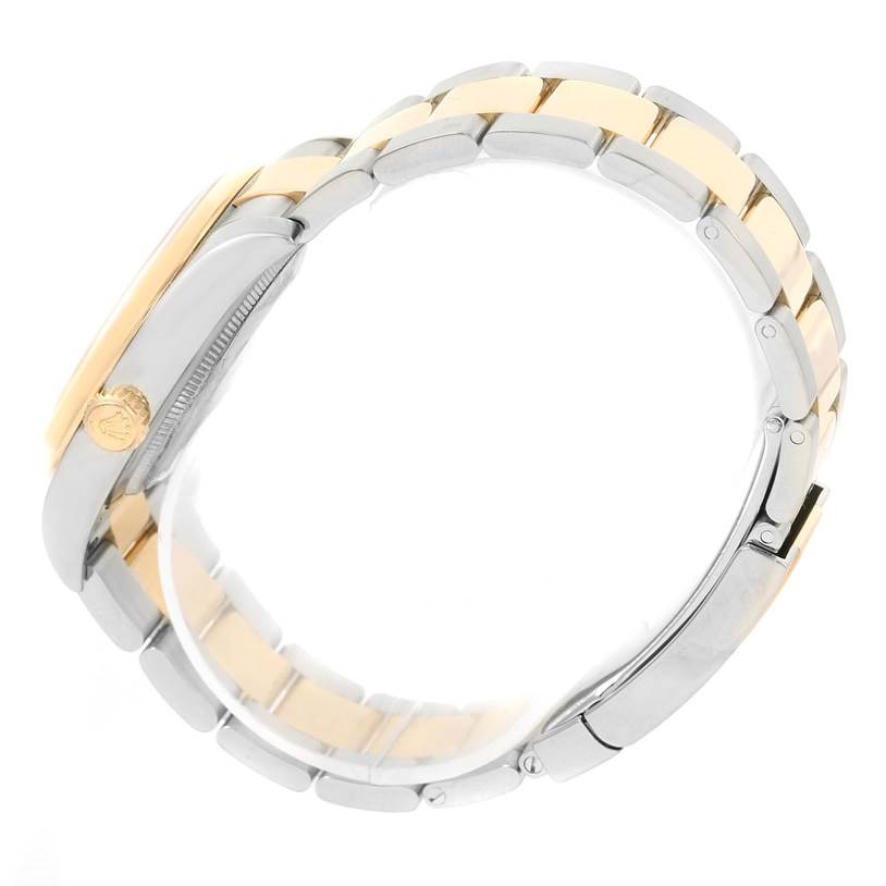 This image shows a side view of a Rolex Datejust 116203 Men's Stainless Steel White Dial 116203 Men's Stainless Steel White Dial watch highlighting its two-tone bracelet and crown.