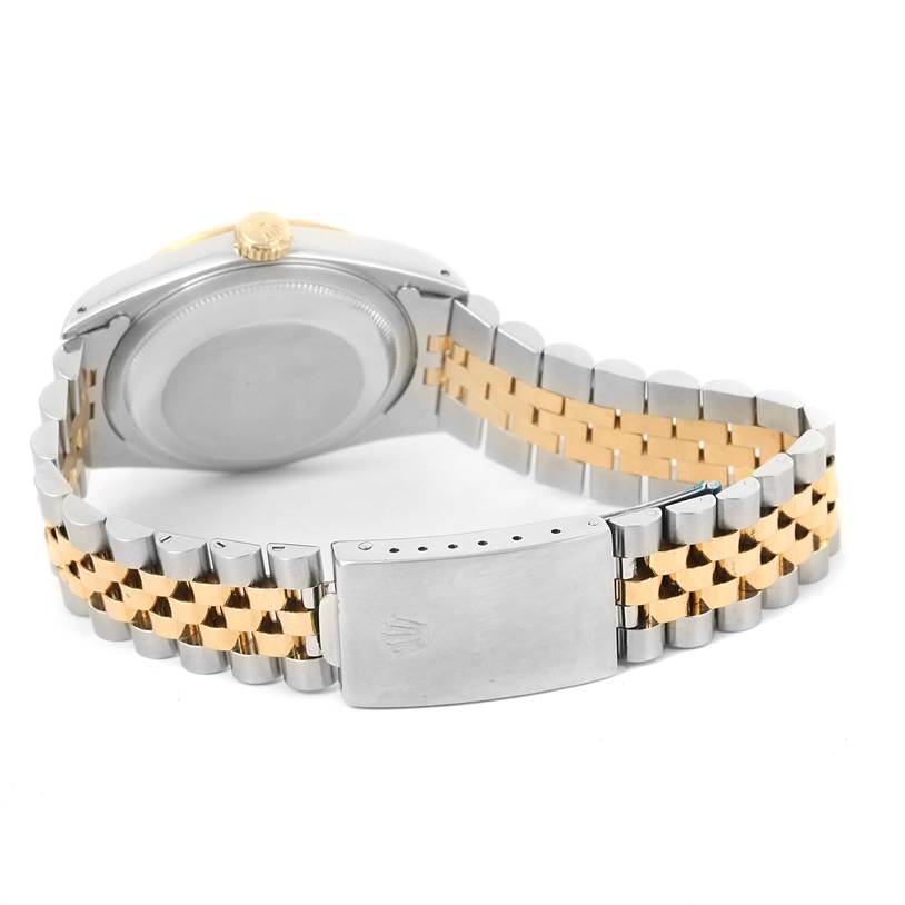 The image shows the back view of a Rolex Datejust 16233 Men's Steel and Gold (two tone) Champagne Dial 16233 Men's Steel and Gold (two tone) Champagne Dial watch, highlighting the case back and the two-tone Jubilee bracelet with clasp.