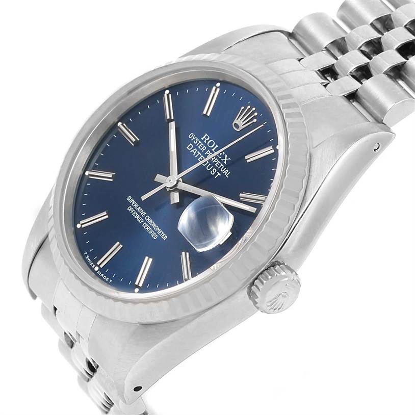 This image shows a side view of a Rolex Datejust 16234 Men's Stainless Steel Blue Dial 16234 Men's Stainless Steel Blue Dial, highlighting its dial, bezel, crown, and part of the bracelet.