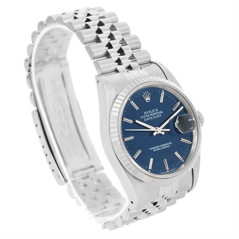 This image shows a Rolex Datejust 16234 Men's Stainless Steel Blue Dial 16234 Men's Stainless Steel Blue Dial watch at a three-quarter angle, highlighting the face, bezel, and jubilee bracelet.