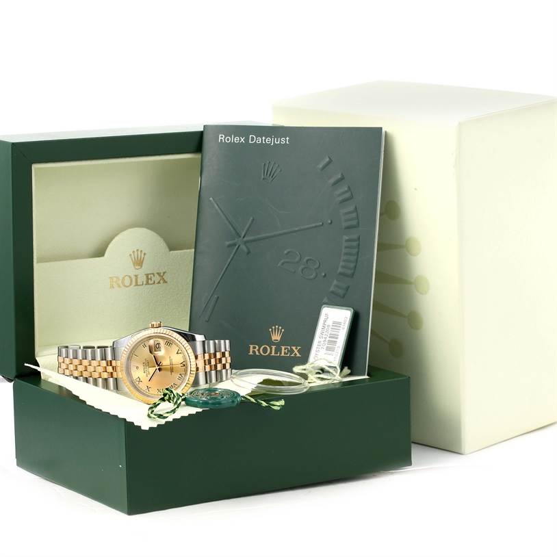 This image shows a Rolex Datejust 116233 Men's Stainless Steel Champagne Dial 116233 Men's Stainless Steel Champagne Dial watch in its box, accompanied by paperwork and accessories, including tags and a manual.