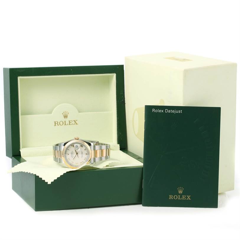 The Rolex Datejust 116203 Men's Stainless Steel Beige Dial 116203 Men's Stainless Steel Beige Dial watch is shown in its open box with a manual beside it.