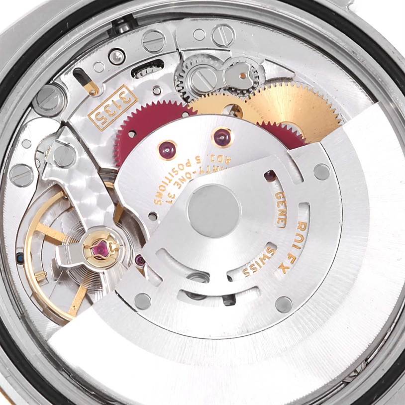 This image shows the internal mechanism of a Rolex Datejust 116233 Men's Stainless Steel White Dial 116233 Men's Stainless Steel White Dial watch viewed from the back.