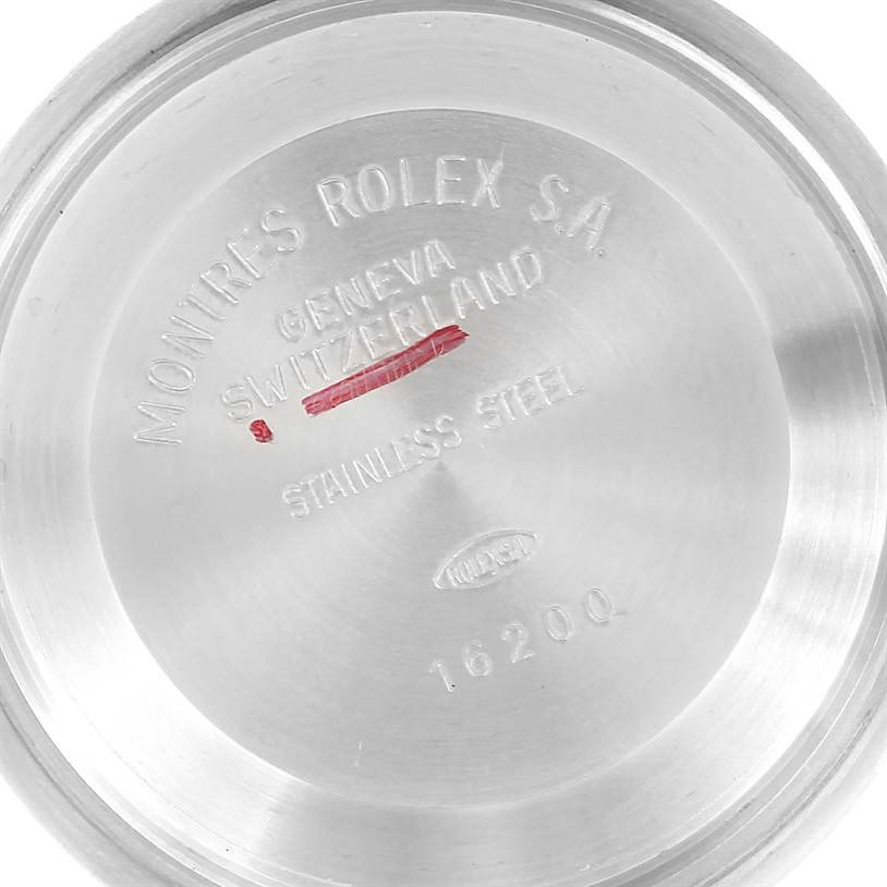 The image shows the inner case back of a Rolex Datejust 16234 Men's Stainless Steel Silver Dial 16234 Men's Stainless Steel Silver Dial watch, featuring model and branding engravings.