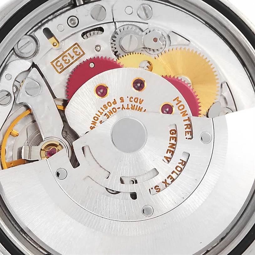 The image shows the internal mechanical movement of a Rolex Datejust 16234 Men's Stainless Steel Silver Dial 16234 Men's Stainless Steel Silver Dial watch, including gears and the rotor.