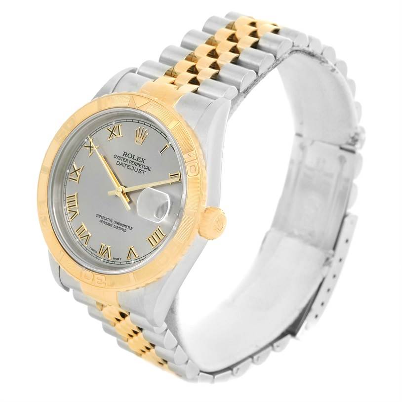 The image shows a Rolex Datejust 16263 Men's Steel and Gold (two tone) Grey Dial 16263 Men's Steel and Gold (two tone) Grey Dial watch at a three-quarter angle, highlighting the bezel, dial, band, and clasp.