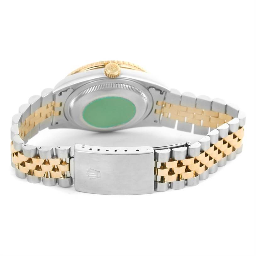 The image shows the rear view of a Rolex Datejust 16263 Men's Steel and Gold (two tone) Grey Dial 16263 Men's Steel and Gold (two tone) Grey Dial watch, highlighting its jubilee bracelet and closed clasp.