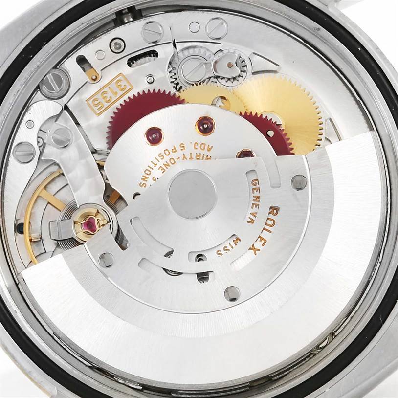 This image shows the movement mechanism of a Rolex Datejust 116233 Men
s Stainless Steel Black Dial 116233 Men
s Stainless Steel Black Dial watch viewed from the back.