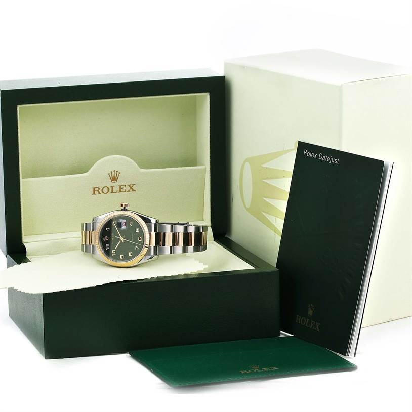 The image shows a Rolex Datejust 116233 Men
s Stainless Steel Black Dial 116233 Men
s Stainless Steel Black Dial watch in its box, along with manuals and additional packaging accessories.