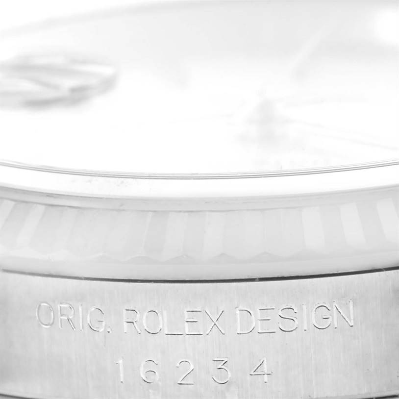 The image shows a close-up of the bezel and case side of a Rolex Datejust 16234 Men
s Stainless Steel Silver Dial 16234 Men
s Stainless Steel Silver Dial, displaying the model number "16234" and "ORIG. ROLEX DESIGN" engraving.