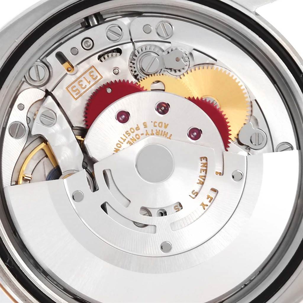 The image shows the inner mechanical components of a Rolex Datejust 116201 Men
s Steel and Gold (two tone) Grey Dial 116201 Men
s Steel and Gold (two tone) Grey Dial watch from the back.