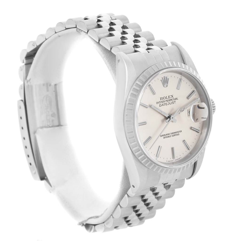 This image shows a Rolex Datejust 16220 Men
s Stainless Steel Silver Dial 16220 Men
s Stainless Steel Silver Dial watch from an angled side view, highlighting the face, bezel, and bracelet.