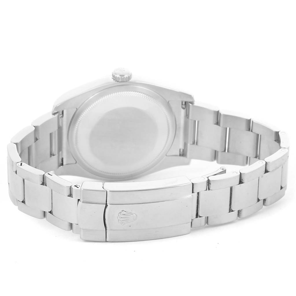 The image shows the back case and metal bracelet of a Rolex Datejust 116200 Men
s Stainless Steel Silver Dial 116200 Men
s Stainless Steel Silver Dial model watch.