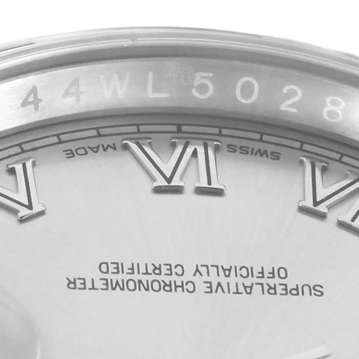 The image displays a partial view of the dial and bezel, highlighting the Roman numeral VI of a Rolex Datejust 116200 Men
s Stainless Steel Silver Dial 116200 Men
s Stainless Steel Silver Dial watch.
