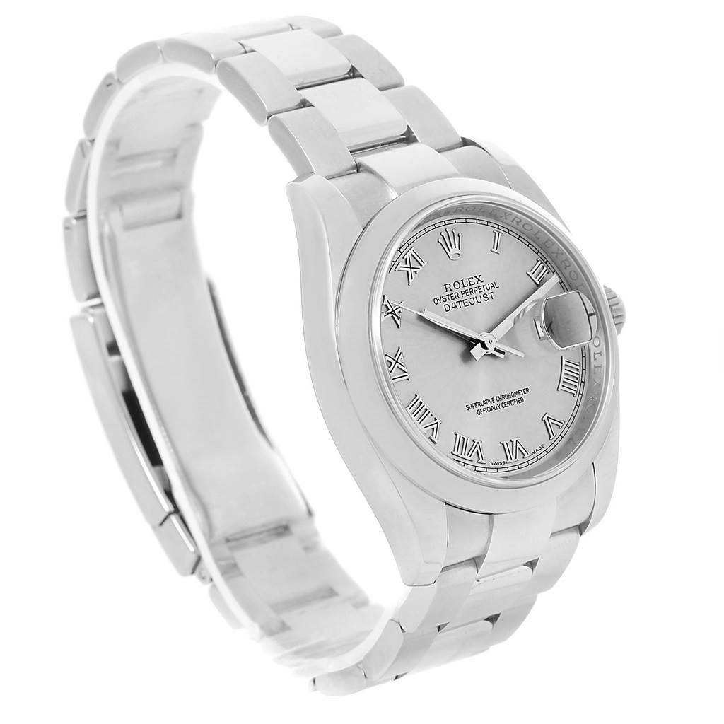 The image shows a Rolex Datejust 116200 Men
s Stainless Steel Silver Dial 116200 Men
s Stainless Steel Silver Dial watch at an angled side view, displaying its bracelet, bezel, dial, and markers.