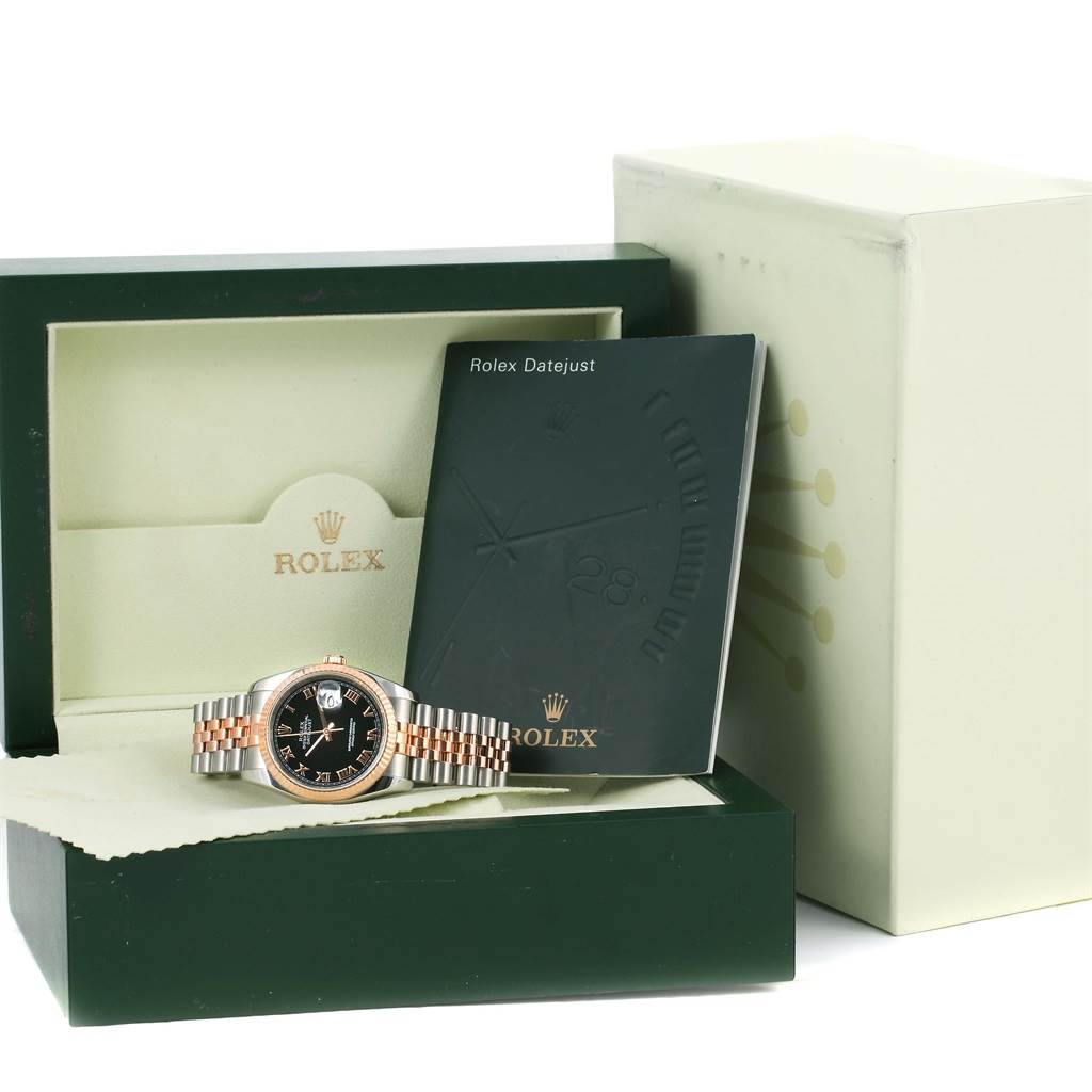The image shows a Rolex Datejust 116231 Men's Steel and Gold (two tone) Black Dial 116231 Men's Steel and Gold (two tone) Black Dial watch with its box, manual, and outer packaging from a front angle.