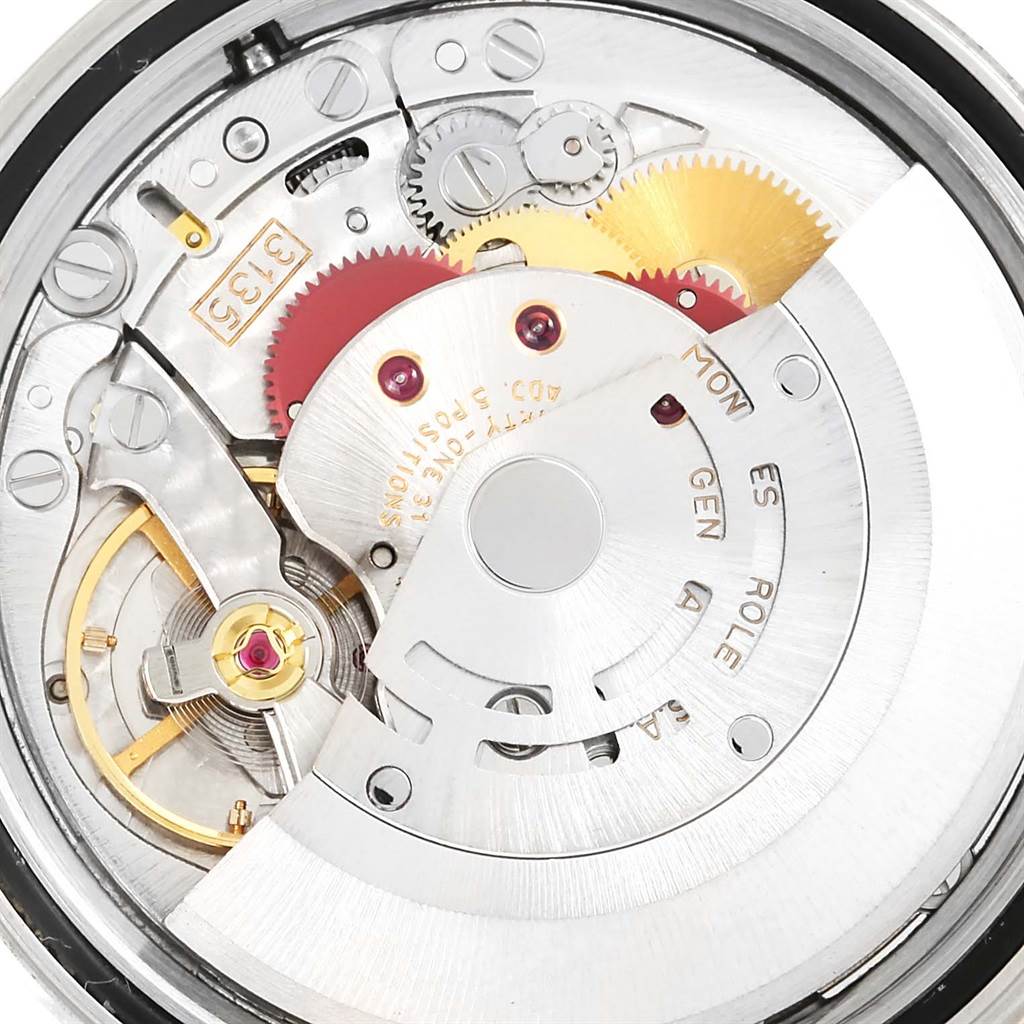 This is a close-up view of the internal movement mechanism of a Rolex Datejust 16233 Men's Steel and Gold (two tone) White Dial 16233 Men's Steel and Gold (two tone) White Dial watch.
