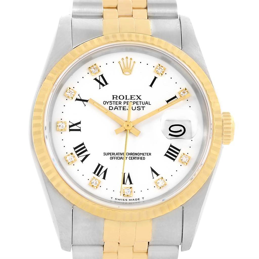 The image shows a close-up view of the face and upper bracelet of a Rolex Datejust 16233 Men's Steel and Gold (two tone) White Dial 16233 Men's Steel and Gold (two tone) White Dial watch with a gold bezel and a two-tone bracelet.