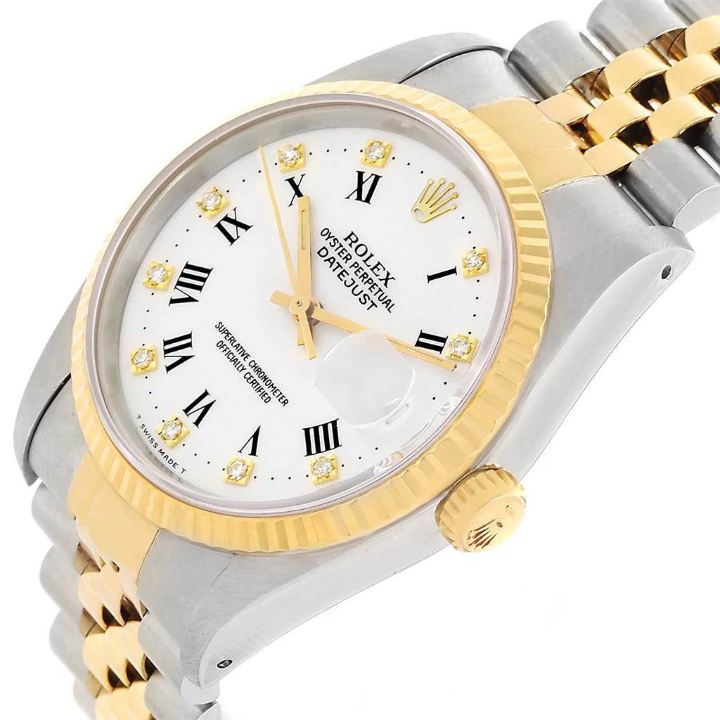 This image shows the dial, bezel, crown, and a partial view of the band of a Rolex Datejust 16233 Men's Steel and Gold (two tone) White Dial 16233 Men's Steel and Gold (two tone) White Dial watch at an angled close-up.