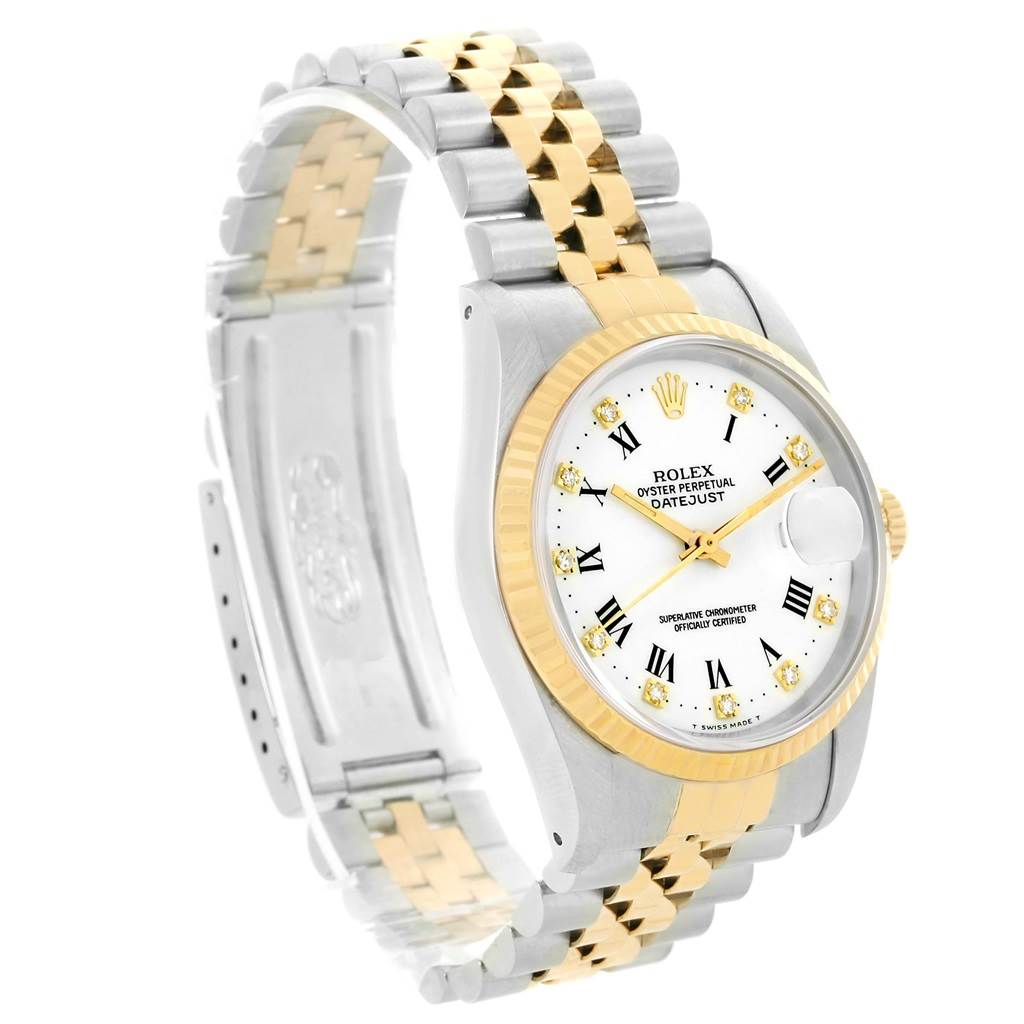 The image shows a Rolex Datejust 16233 Men's Steel and Gold (two tone) White Dial 16233 Men's Steel and Gold (two tone) White Dial watch at a three-quarter angle, highlighting its two-tone bracelet, bezel, and white dial with Roman numerals.