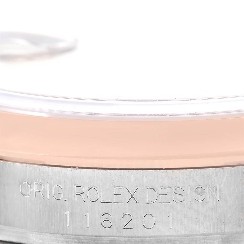 This image shows the side casing of a Rolex Datejust 116201 Steel and Gold (two tone) Black Dial 116201 Steel and Gold (two tone) Black Dial model, featuring the engraved model number 116201.