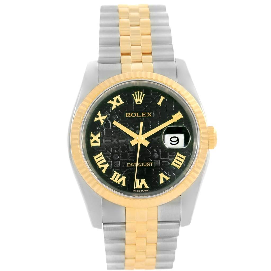 The Rolex Datejust 116233 Men's Stainless Steel Black Dial 116233 Men's Stainless Steel Black Dial watch is shown from the front, displaying its black dial, two-tone bracelet, and date feature under a magnifying lens.