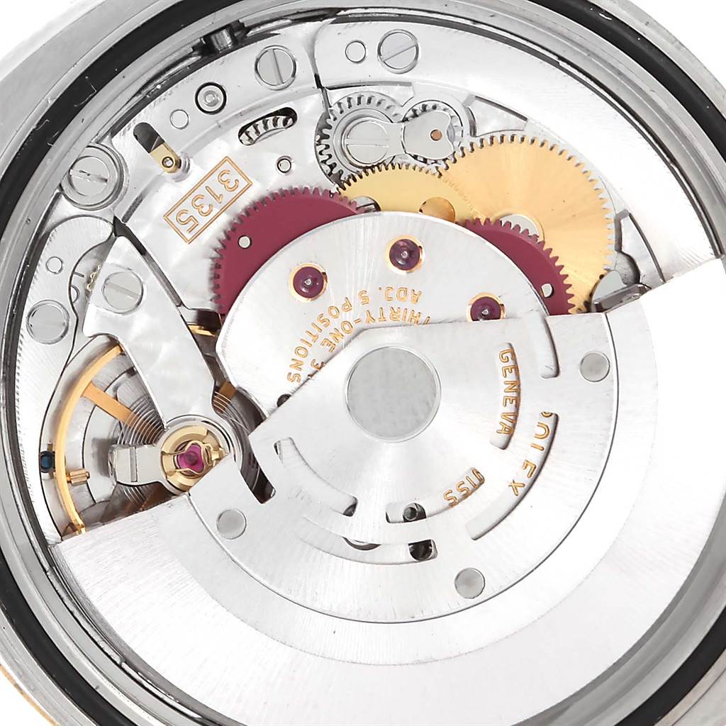 The image shows the movement mechanism of a Rolex Datejust 116233 Men's Stainless Steel Black Dial 116233 Men's Stainless Steel Black Dial model watch from the back angle.