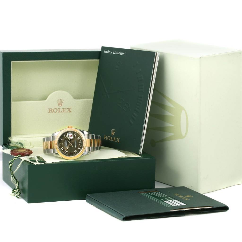 The image shows a Rolex Datejust 116233 Men
s Stainless Steel Brown Dial 116233 Men
s Stainless Steel Brown Dial watch with its box, booklet, and warranty card.
