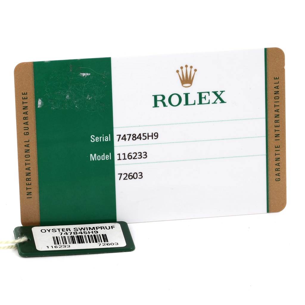 This image shows the warranty card and Oyster Swimpruf tag for a Rolex Datejust 116233 Men's Stainless Steel Green Dial 116233 Men's Stainless Steel Green Dial model 116233.