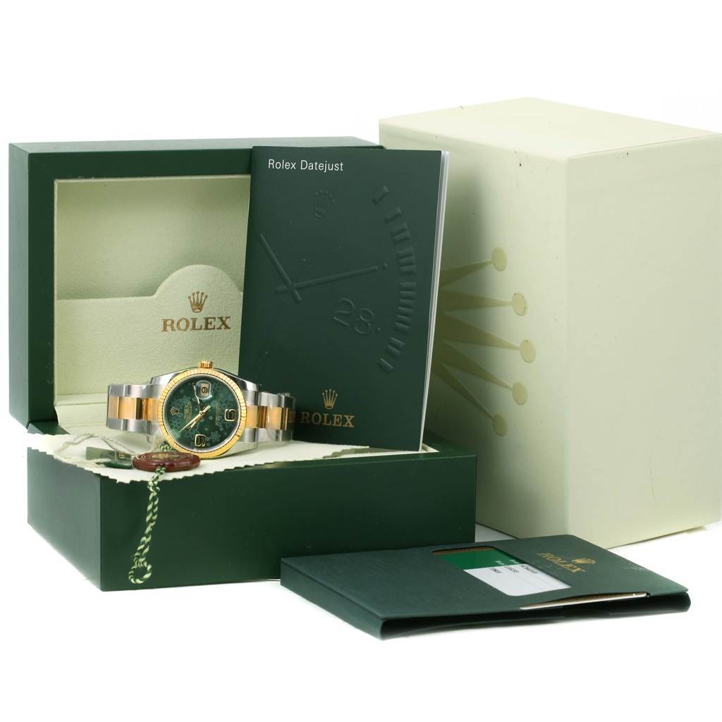 This image shows a Rolex Datejust 116233 Men's Stainless Steel Green Dial 116233 Men's Stainless Steel Green Dial watch in its green box, along with a booklet and cardholder.