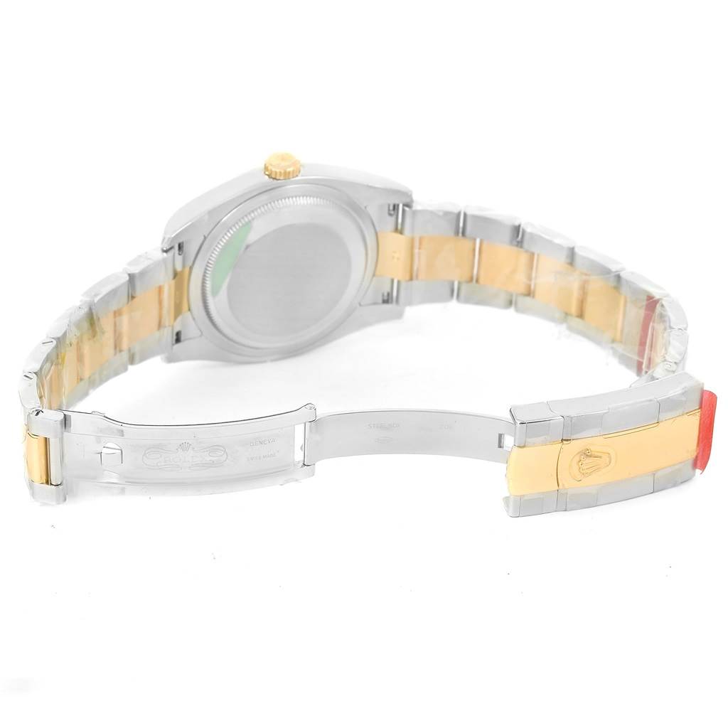 This image shows the backside and partially opened bracelet of a Rolex Datejust 116233 Men's Stainless Steel Green Dial 116233 Men's Stainless Steel Green Dial watch.