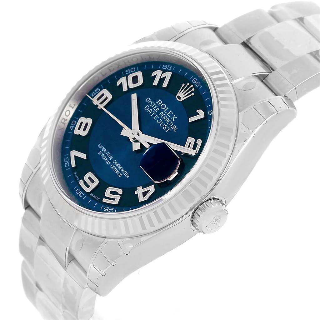 The image shows a Rolex Datejust 116234 Men
s Stainless Steel Blue Dial 116234 Men
s Stainless Steel Blue Dial watch at an angled view, highlighting the dial, bezel, crown, and part of the bracelet.