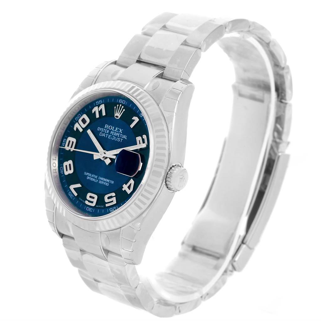 The image shows a side-angle view of a Rolex Datejust 116234 Men
s Stainless Steel Blue Dial 116234 Men
s Stainless Steel Blue Dial watch, featuring its bracelet, bezel, dial, and crown.