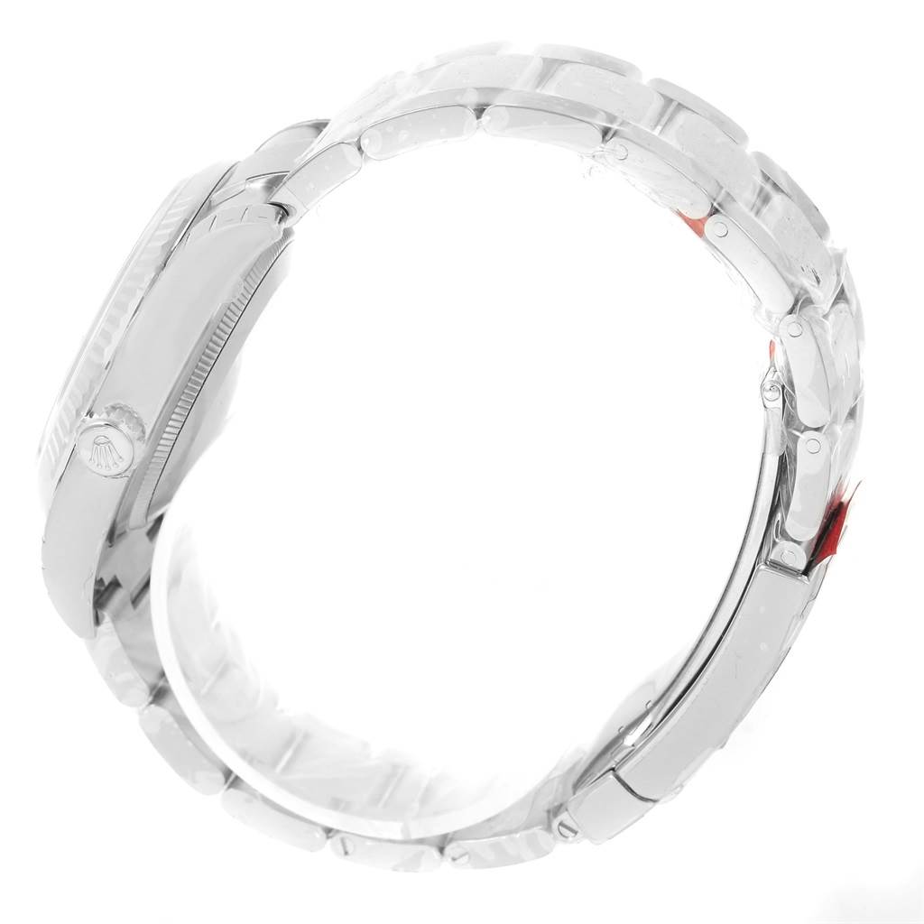 The image shows a side view of the Rolex Datejust 116234 Men
s Stainless Steel Blue Dial 116234 Men
s Stainless Steel Blue Dial model, focusing on the case, crown, and bracelet links.