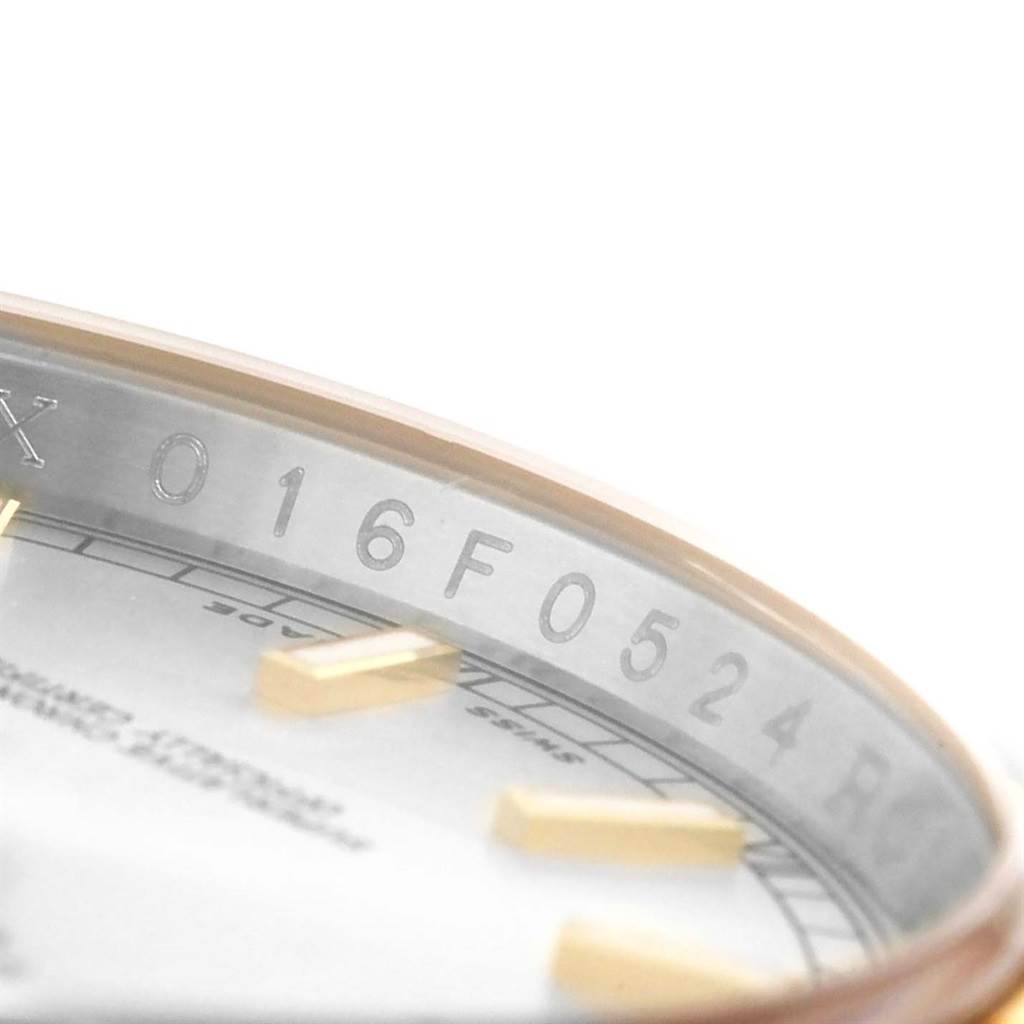 This image shows a close-up of the rehaut with serial numbers on a Rolex Datejust 116233 Men's Stainless Steel Silver Dial 116233 Men's Stainless Steel Silver Dial watch.