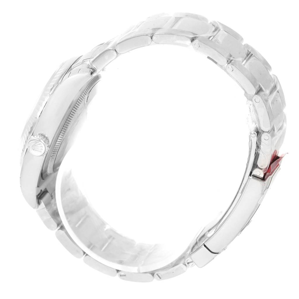 The image shows a Rolex Datejust 116234 Men's Stainless Steel Black Dial 116234 Men's Stainless Steel Black Dial watch from a side angle, highlighting the crown, case, and bracelet links.