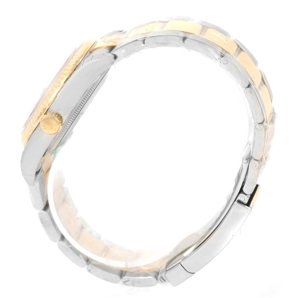 The image shows a side view of the Rolex Datejust 116233 Men
s Stainless Steel Black Dial 116233 Men
s Stainless Steel Black Dial watch, highlighting the crown, bezel, and a portion of the bracelet.