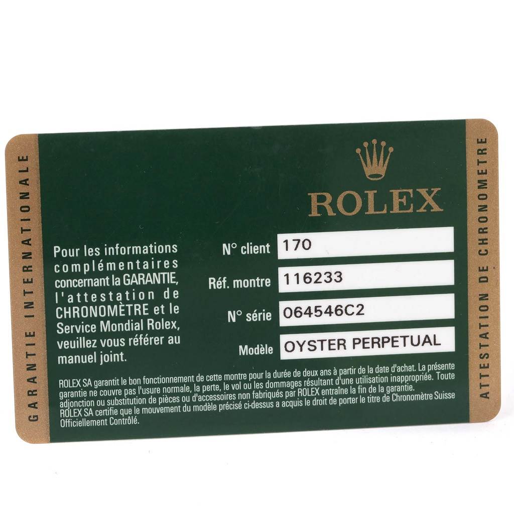 The image shows a Rolex Datejust 116233 Men
s Stainless Steel Black Dial 116233 Men
s Stainless Steel Black Dial warranty card with model, reference, and serial numbers.