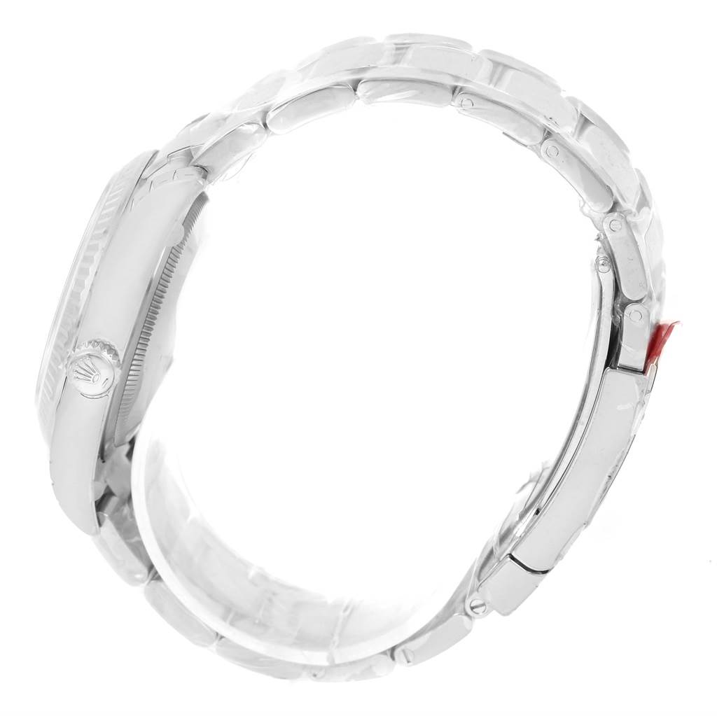 The image shows a side view of the Rolex Datejust 116234 Men
s Stainless Steel White Dial 116234 Men
s Stainless Steel White Dial watch, highlighting the crown and the bracelet clasp.