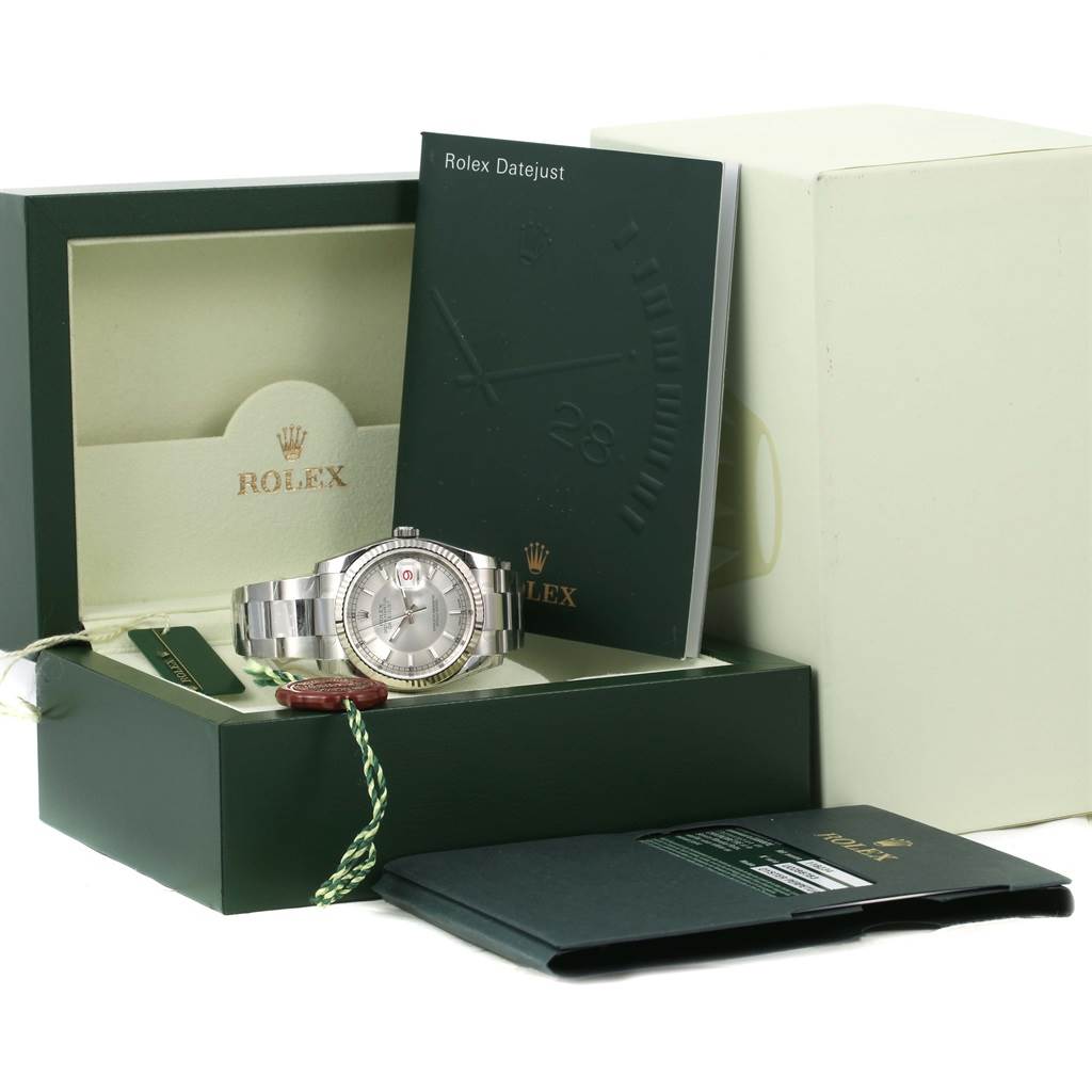 The Rolex Datejust 116234 Men
s Stainless Steel Silver Dial 116234 Men
s Stainless Steel Silver Dial watch is shown face-up with its box, manual, and Best Quality
ity card.