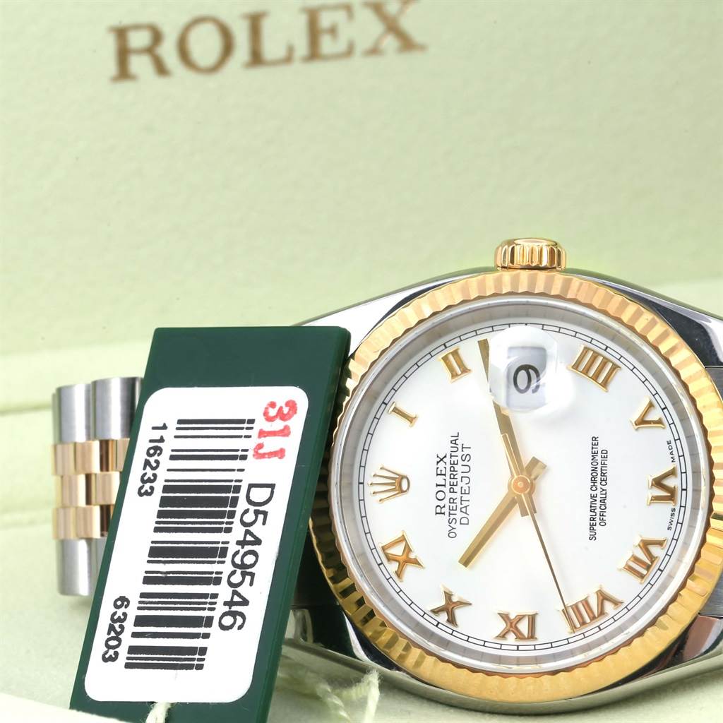 This image shows a close-up, angled view of the Rolex Datejust 116233 Men's Stainless Steel White Dial 116233 Men's Stainless Steel White Dial model, highlighting the face, bezel, and some of the bracelet.