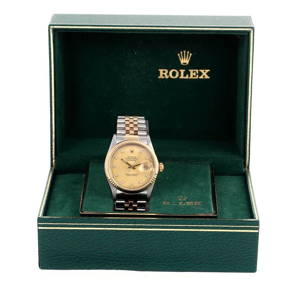 The Rolex Datejust 16013 Stainless Steel Champagne Dial 16013 Stainless Steel Champagne Dial watch is shown from the front, displayed in an open Rolex box.