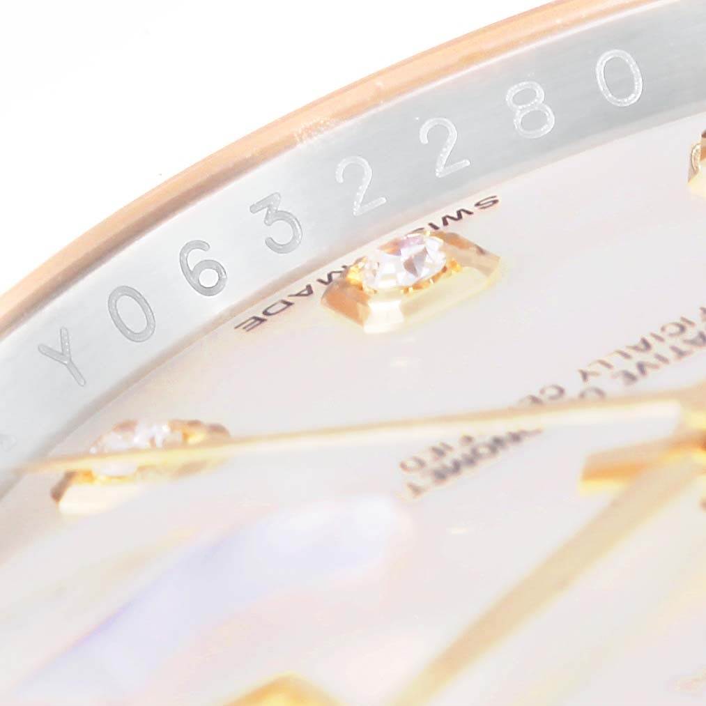 This close-up angle shows the serial number and part of the dial with diamond markers of the Rolex Datejust 116243 Men's Stainless Steel Mother of Pearl Dial 116243 Men's Stainless Steel Mother of Pearl Dial watch.