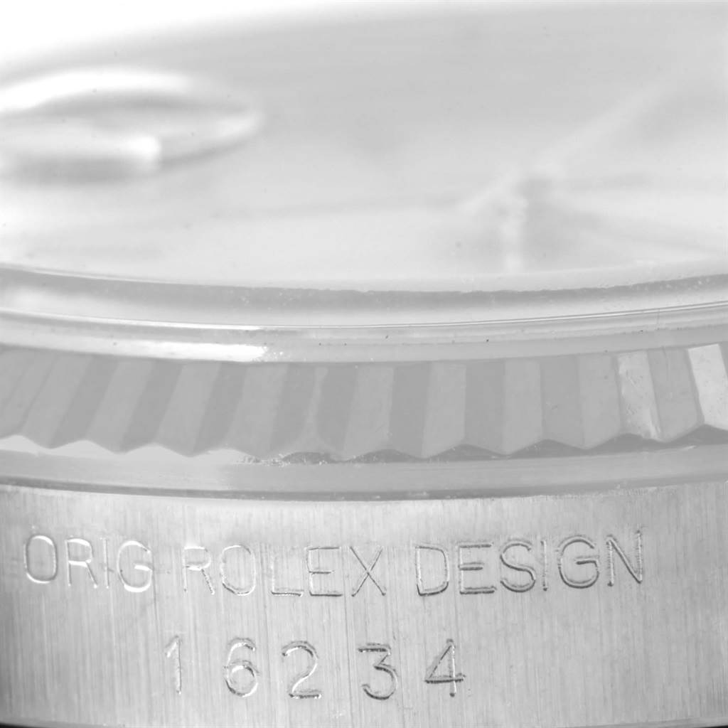 The image shows a close-up angle of the case and bezel of a Rolex Datejust 16234 Men's Stainless Steel Silver Dial 16234 Men's Stainless Steel Silver Dial model, highlighting the model number and "Orig Rolex Design" inscription.
